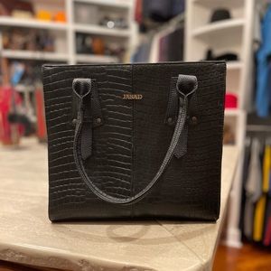 Handmade genuine leather handbag by Jasad